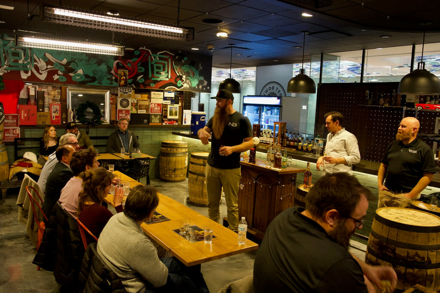 Demetrius of Nobletons Distilling leading a tasting at Slightly Toasted in Chicago
